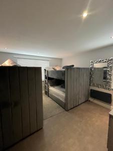 a room with two bunk beds in it at 19 Rodney Street Apartments in Liverpool