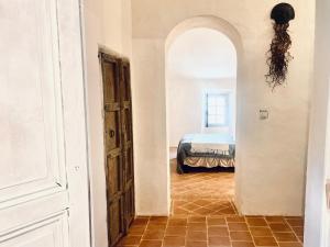 Postel nebo postele na pokoji v ubytování La Bastide