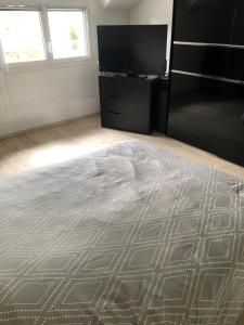 Posteľ alebo postele v izbe v ubytovaní Chambres chez Philippe