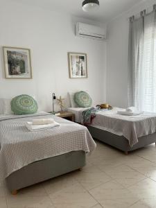 Ένα ή περισσότερα κρεβάτια σε δωμάτιο στο Bella Terra Villa