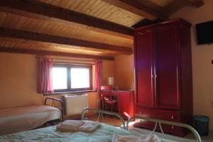 Postel nebo postele na pokoji v ubytování Il Rifugio di Pan