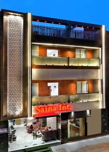 a santa line building with a santa line sign at The Saina International - New Delhi - by La Exito Hotels in New Delhi