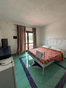 Postel nebo postele na pokoji v ubytování Anima Rooms & Pool + 37 fotografií