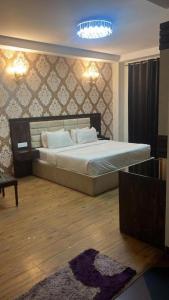 Katil atau katil-katil dalam bilik di Hotel Karnal Haveli
