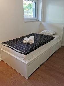 Voodi või voodid majutusasutuse Naia Apartments toas