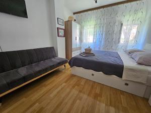 Postel nebo postele na pokoji v ubytování Sobe Biserka i Mario Brseč