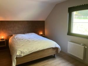 Postel nebo postele na pokoji v ubytování Gîte La Guemonce