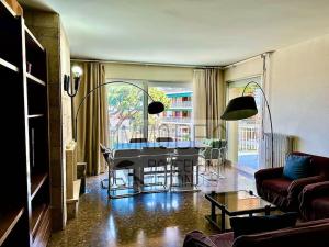 a living room with a table and a couch at BV-SV-002-Mediterrani in Sant Andreu de Llavaneres