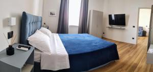 Letto o letti in una camera di 49 Downtown Pompeii