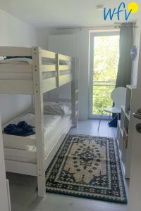 Postel nebo postele na pokoji v ubytování Villa Düna Ferienwohnung 3