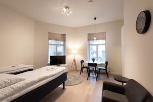 Ένα ή περισσότερα κρεβάτια σε δωμάτιο στο Forenom Serviced Apartments Turku Uudenmaankatu