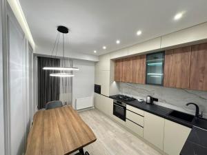Virtuvė arba virtuvėlė apgyvendinimo įstaigoje New Apartment Ciocana