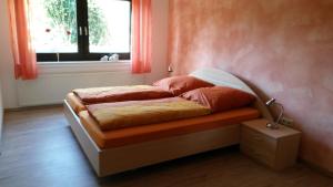 Кровать или кровати в номере Ferienwohnung Familie Balko