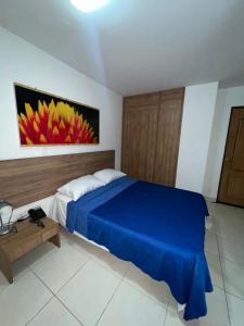 Hotel Condina Pereira客房内的一张或多张床位