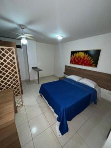 Hotel Condina Pereira客房内的一张或多张床位