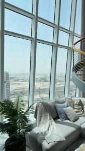 Un lugar para sentarse en Charming Duplex 1 Bdr Apartment