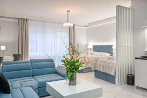 Postel nebo postele na pokoji v ubytování Hotel SPA Faltom Gdynia Rumia