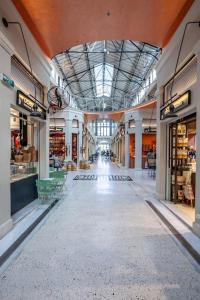 a hallway of a shopping mall with a store at FsN Central Lofts 303 /2bed / 5P in Thessaloniki
