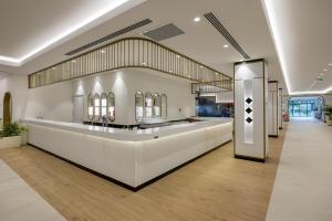 a dressing room with a counter with mirrors on the wall at Marvida Family Eco - Ultra All Inclusive & Kids Concept in Side