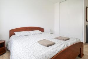 Posteľ alebo postele v izbe v ubytovaní Appartement dans résidence au calme avec piscine