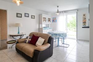 Posedenie v ubytovaní Appartement dans résidence au calme avec piscine