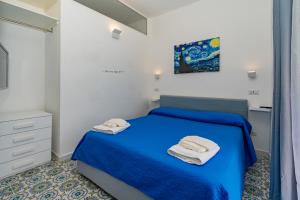 Кровать или кровати в номере Casa L'Aurora