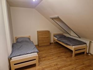 Katil atau katil-katil dalam bilik di Sherpa's Hostel High Tatras