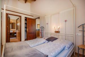 a bedroom with a bed in a room at Buena Vista in Montuiri +25 photos