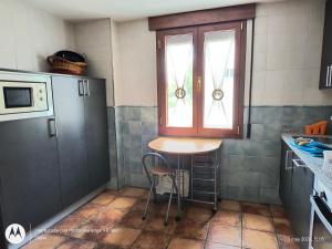 Kuchyň nebo kuchyňský kout v ubytování Casa Rural Casa Jacinta