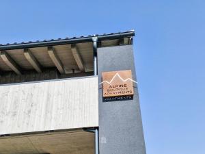 a sign on the side of a building at Apartment be magic by Interhome in Mieming