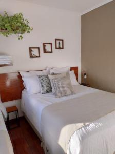 Hospedaria Canto do Vinhedo客房内的一张或多张床位