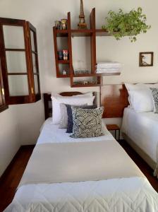 Hospedaria Canto do Vinhedo客房内的一张或多张床位