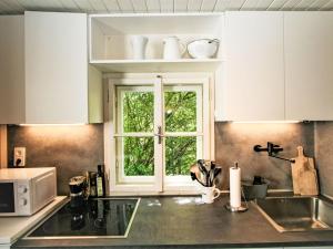 Köök või kööginurk majutusasutuses Holiday Home s`Hüttl reloaded by Interhome