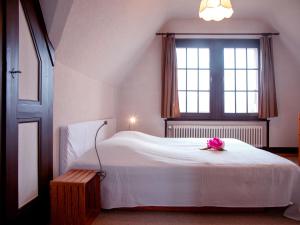 Postel nebo postele na pokoji v ubytování Apartment Plan Névé 5 by Interhome