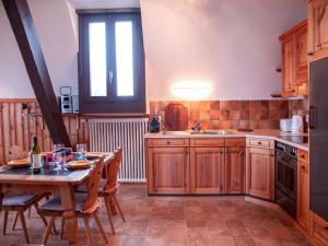 Kuchyň nebo kuchyňský kout v ubytování Apartment Plan Névé 5 by Interhome