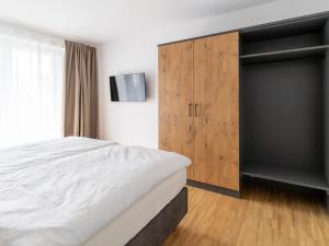 Rúm í herbergi á Apartment be balance by Interhome +15 myndir