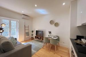 TV a/nebo společenská místnost v ubytování The Green House - Oporto Charming Apartment