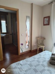 Postel nebo postele na pokoji v ubytování Casa Rural Casa Jacinta