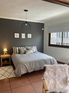 Postel nebo postele na pokoji v ubytování Terrazas de Rondeau