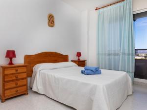Ένα ή περισσότερα κρεβάτια σε δωμάτιο στο Apartment Pepa House by Interhome