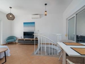 Et tv og/eller underholdning på Apartment Sun4Fun by Interhome + 21 billeder