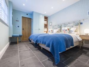 Katil atau katil-katil dalam bilik di Holiday Home Wella by Interhome