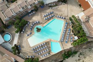 an overhead view of a swimming pool at a resort at VOI Praia de Chaves Resort in Sal Rei