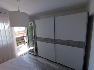 Postel nebo postele na pokoji v ubytování Apartments Borić
