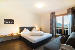 Postel nebo postele na pokoji v ubytování Hotel Schönbrunn + 22 fotografií
