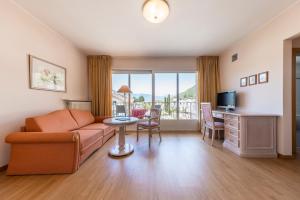 Televízia a/alebo spoločenská miestnosť v ubytovaní Weingarten Terlan - Rooms & Breakfast