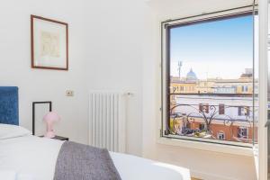 Posteľ alebo postele v izbe v ubytovaní Giulio Cesare Penthouse Rental in Rome