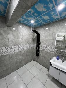 a bathroom with a sink and a pipe at Sultanahmet private home in Istanbul