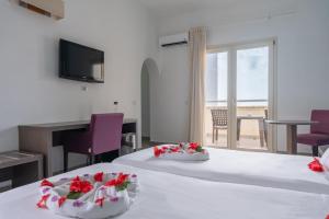 TV a/nebo společenská místnost v ubytování VOI Praia de Chaves Resort