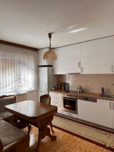 A cozinha ou kitchenette de Cozy House